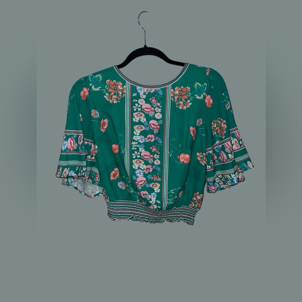 Green cropped dress shirt.
